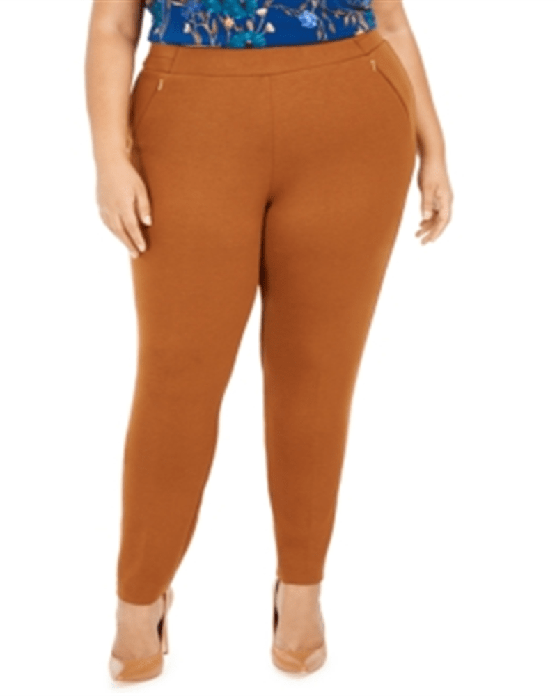 Front of a model wearing a size 20W Calvin Klein Women's Pull-on Zippered-Pocket Pants Brown 20W in Brown by Calvin Klein. | dia_product_style_image_id:307306
